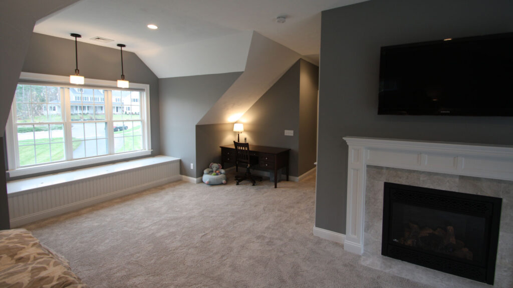 Master Suite addition with custom built in and gas fireplace