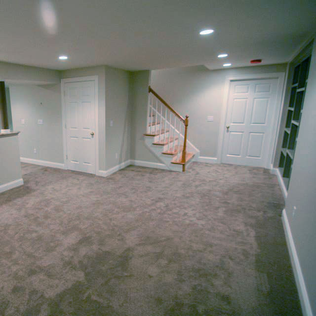 Finished basement with carpet