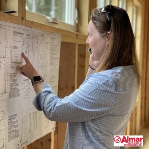 Allison Guido Reviewing Addition Plans