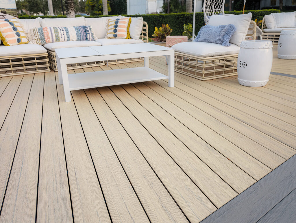 High-performance composite decking boards showing the protective capping that prevents cracking and peeling during harsh New England winters.