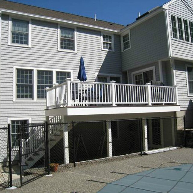 Gray Siding and white railings