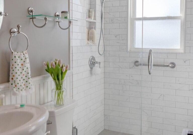 Bathroom Remodel Weymouth Ma, with Pedestal sink, and walk in tile shower. 